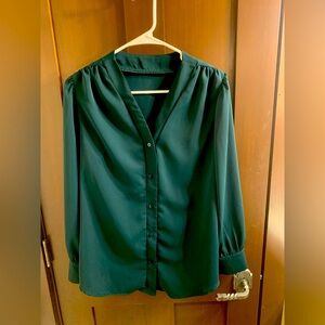 Dark green blouse. Button up.